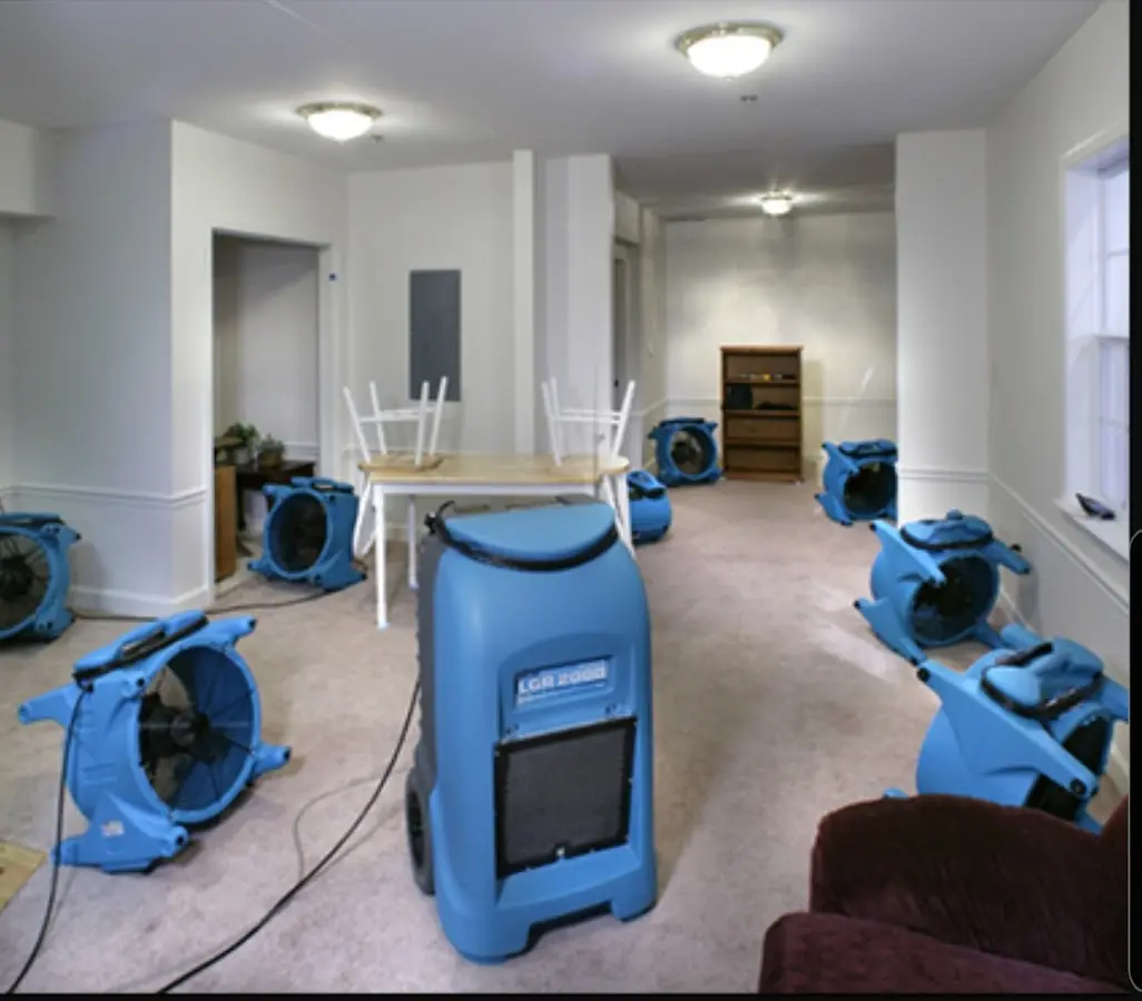 Air movers and dehumidifier setup for Water Damage Restoration in Nottingham